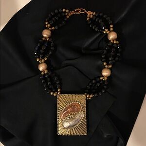 NECKLACE: HAND CRAFTED WITH GOLD SEA SHELL EXART BELT BUCKLE. BLACK/GOLD BEADS!